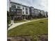 Modern townhome community with well-manicured lawns and sidewalks, creating a welcoming atmosphere at 2908 Kempthorne Rd # 53, Cary, NC 27519