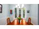 Charming dining room with a bay window providing natural light, with beautiful decor at 3137 Falling Cedars Dr, Chapel Hill, NC 27516
