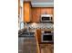 Close up on stainless steel kitchen sink and granite countertops at 3137 Falling Cedars Dr, Chapel Hill, NC 27516