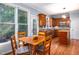 Cozy eat-in kitchen with stainless appliances, wood cabinets, and natural light at 3137 Falling Cedars Dr, Chapel Hill, NC 27516