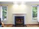 Living room view with fireplace and natural light at 3137 Falling Cedars Dr, Chapel Hill, NC 27516