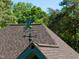 Close up image features an ornate copper weathervane on the home at 3137 Falling Cedars Dr, Chapel Hill, NC 27516
