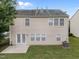 This home boasts a cozy back exterior with a small concrete patio and a well-maintained lawn at , Raleigh, NC 27610