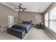 Spacious bedroom with vaulted ceilings, a ceiling fan, and large windows providing ample natural light at , Raleigh, NC 27610