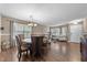 Cozy dining area with hardwood floors, open floor plan, and a round dining table for Gathering gatherings at , Raleigh, NC 27610