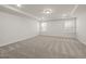 Bright, carpeted room with crown molding and natural light at 344 Bridle Brook Way, Fuquay Varina, NC 27526