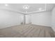 A neutral bedroom with a tray ceiling and carpeted floors offers a serene and comfortable space at 344 Bridle Brook Way, Fuquay Varina, NC 27526