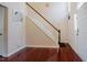 Entryway featuring hardwood floors and a traditional staircase at 413 Barnard Castle Ct, Rolesville, NC 27571