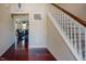 Entryway featuring hardwood floors and staircase at 413 Barnard Castle Ct, Rolesville, NC 27571