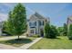 Charming two-story home with beautiful landscaping and a welcoming entrance at 413 Barnard Castle Ct, Rolesville, NC 27571