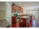 Kitchen with stainless steel appliances, granite countertops, and a center island at 413 Barnard Castle Ct, Rolesville, NC 27571