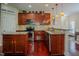 Well-equipped kitchen boasts granite countertops, stainless steel appliances, and ample cabinet space at 413 Barnard Castle Ct, Rolesville, NC 27571
