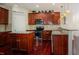 Well-equipped kitchen boasts granite countertops, stainless steel appliances, and ample cabinet space at 413 Barnard Castle Ct, Rolesville, NC 27571