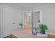 Home office with a modern desk, stylish decor, and a view into the stairwell at 418 Wyndham Drive, Chapel Hill, NC 27516