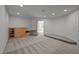 Bonus room with built-in cabinets, neutral carpet and recessed lighting at 4312 Mystic Ln, Hillsborough, NC 27278