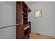 Spacious walk-in closet with wooden shelving and hanging rods at 4312 Mystic Ln, Hillsborough, NC 27278