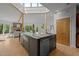 Kitchen with a center island, stainless steel appliances, hardwood floors, and a sink at 4312 Mystic Ln, Hillsborough, NC 27278