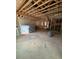 Unfinished basement area showing exposed insulation and studded walls, ready for design at 444 Golden Dragonfly St, Wake Forest, NC 27587