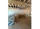 Unfinished basement area showing exposed insulation and studded walls, ready for design at 444 Golden Dragonfly St, Wake Forest, NC 27587