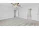 Spacious bedroom with carpet flooring and a ceiling fan at 444 Golden Dragonfly St, Wake Forest, NC 27587