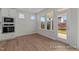 Bright, airy kitchen features stainless appliances and large windows offering a great view at 444 Golden Dragonfly St, Wake Forest, NC 27587