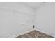 Spacious walk-in closet featuring wire shelving, and wood-look floors at 444 Golden Dragonfly St, Wake Forest, NC 27587