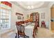 Traditional dining room with decorative moldings and tray ceiling at 46 Spring Haven Ln, Willow Springs, NC 27592