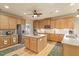 Spacious kitchen featuring stainless steel appliances and granite countertops at 46 Spring Haven Ln, Willow Springs, NC 27592