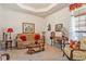Cozy living room features neutral walls and carpet at 46 Spring Haven Ln, Willow Springs, NC 27592