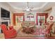 Spacious living room features fireplace, coffered ceiling, and large windows at 46 Spring Haven Ln, Willow Springs, NC 27592