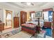 Comfortable main bedroom with elegant furnishings, ensuite bathroom and plush carpeting at 46 Spring Haven Ln, Willow Springs, NC 27592