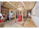 Unfinished basement area with wooden cage and storage; ready for customization and additional square footage at 4709 Edwards Mill Rd # H, Raleigh, NC 27612