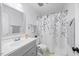 Clean bathroom with a modern vanity, updated fixtures, and a shower-tub combination at 4709 Edwards Mill Rd # H, Raleigh, NC 27612