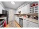 Updated kitchen features stainless steel appliances, granite countertops, and a stylish backsplash at 4709 Edwards Mill Rd # H, Raleigh, NC 27612