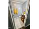 Compact bathroom featuring stylish vanity, toilet, and tiled shower-tub combination at 5129 Neighbors Rd, Mebane, NC 27302