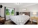 Bright bedroom with a large window offering views of the surrounding landscape at 5129 Neighbors Rd, Mebane, NC 27302