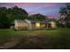 Charming brick ranch-style home featuring a screened porch and covered front porch, nestled on a spacious lot with mature trees at 5129 Neighbors Rd, Mebane, NC 27302