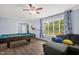 Inviting game room features a pool table, comfortable seating, and natural light at 5129 Neighbors Rd, Mebane, NC 27302
