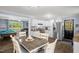 Open-concept living area blends the kitchen, dining, and game room at 5129 Neighbors Rd, Mebane, NC 27302