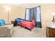 A cozy ' bedroom boasts a fun Spiderman themed bed and decor at 5312 Suntan Lake Dr, Raleigh, NC 27610