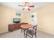 Cozy room featuring a window, ceiling fan, and simple furnishings, perfect for a bedroom or home office at 5312 Suntan Lake Dr, Raleigh, NC 27610