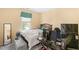 Comfortable bedroom offers ample space and a window view at 5312 Suntan Lake Dr, Raleigh, NC 27610