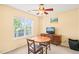 Cozy room featuring a window, ceiling fan, and simple furnishings, perfect for a bedroom or home office at 5312 Suntan Lake Dr, Raleigh, NC 27610