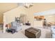 Spacious living room showing the open layout to the kitchen and entrance, with high ceilings and natural light at 5312 Suntan Lake Dr, Raleigh, NC 27610