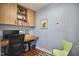 Home office featuring wood desk, built in shelving, and light blue walls at 601 W Rosemary St # 416, Chapel Hill, NC 27516
