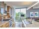 Gourmet kitchen featuring stainless steel appliances, granite countertops, and ample natural light at 601 W Rosemary St # 416, Chapel Hill, NC 27516