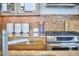 Bright kitchen featuring stainless steel appliances and tile backsplash at 601 W Rosemary St # 416, Chapel Hill, NC 27516