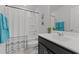Bathroom with a shower and tub, mirror, and modern vanity at 6415 Mentor Pl, Raleigh, NC 27616