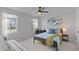Bright bedroom with a comfortable bed, modern decor, and ample natural light creating a relaxing space at 6415 Mentor Pl, Raleigh, NC 27616