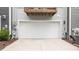 A two car garage and driveway at 6415 Mentor Pl, Raleigh, NC 27616